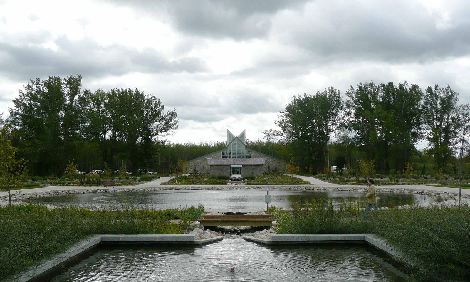 International Peace Garden. Looking across walkways and water feature to the Interpretive Centre in the far distance.